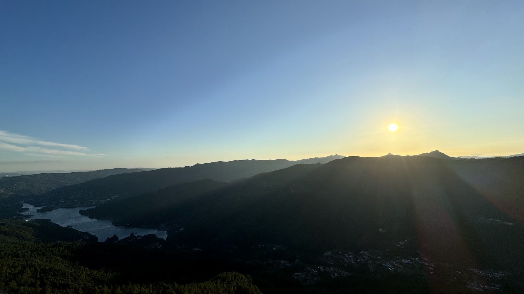 Sunset over a mountain lake in Gerês, Portugal